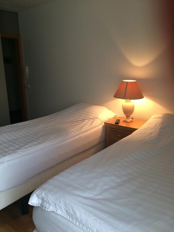 Hotel Ibudir Apartments Akureyri Quarto foto